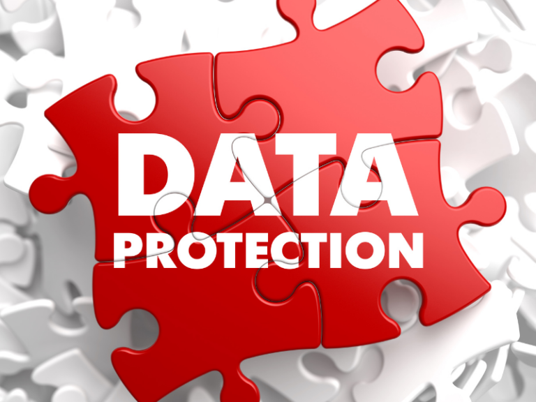Red puzzle pieces with bold white text "DATA PROTECTION" against a white puzzle background.