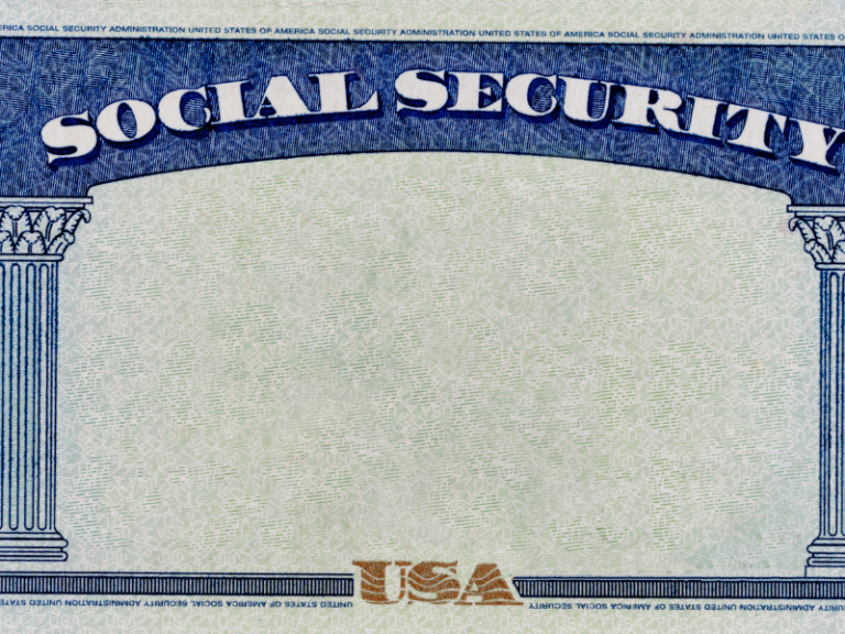 Close-up of a blank United States Social Security card with blue and white design.