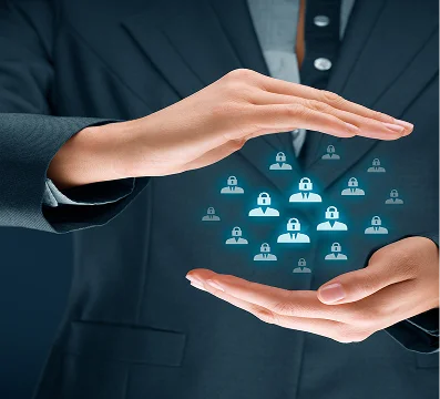 Businessperson in dark suit holding holographic icons of locked user profiles between hands.